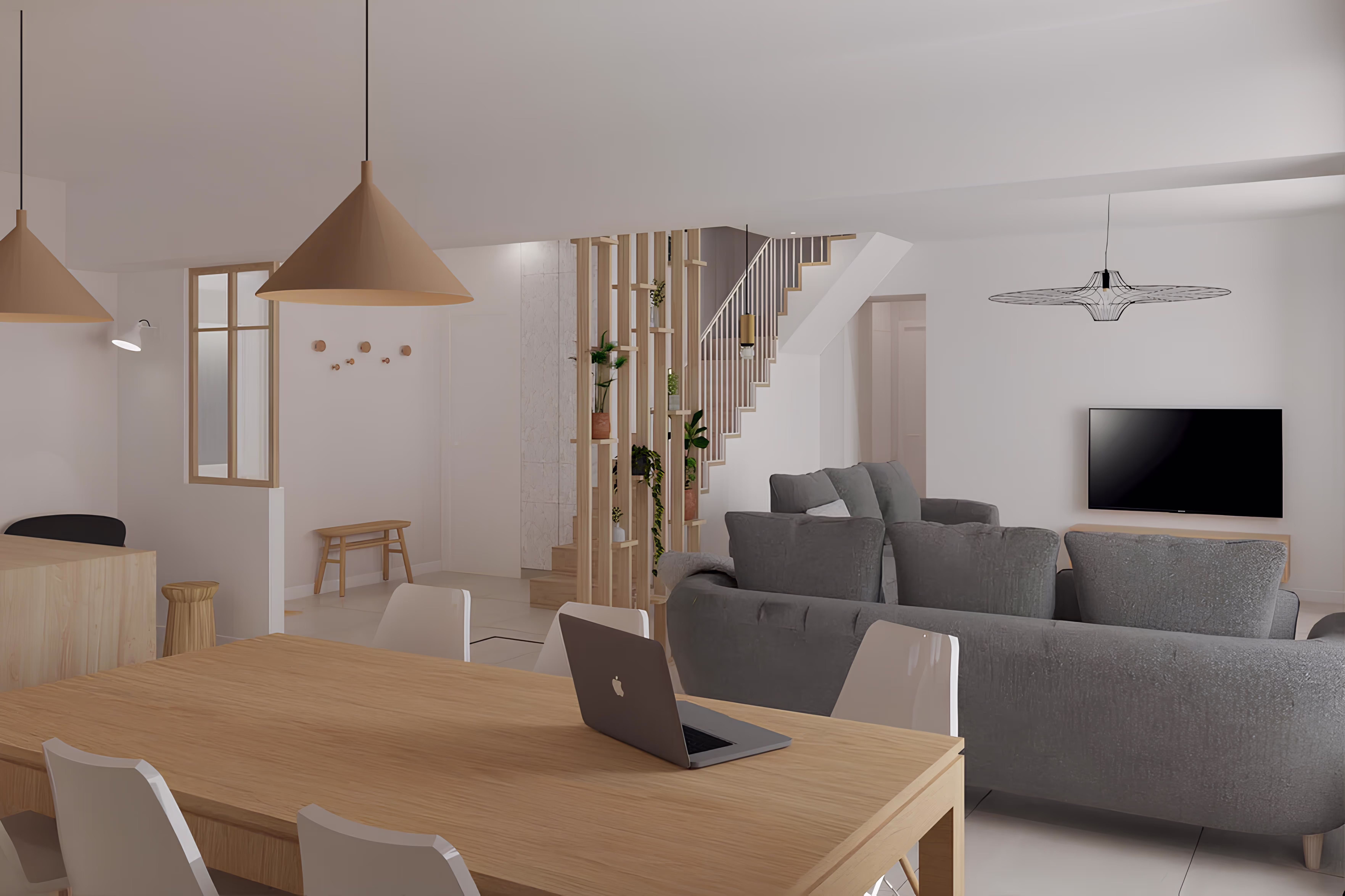 Vue depuis la salle à manger vers le salon et l’escalier, montrant un intérieur épuré et fonctionnel, projet Corps de ferme La Basse par SINA Architecture.
