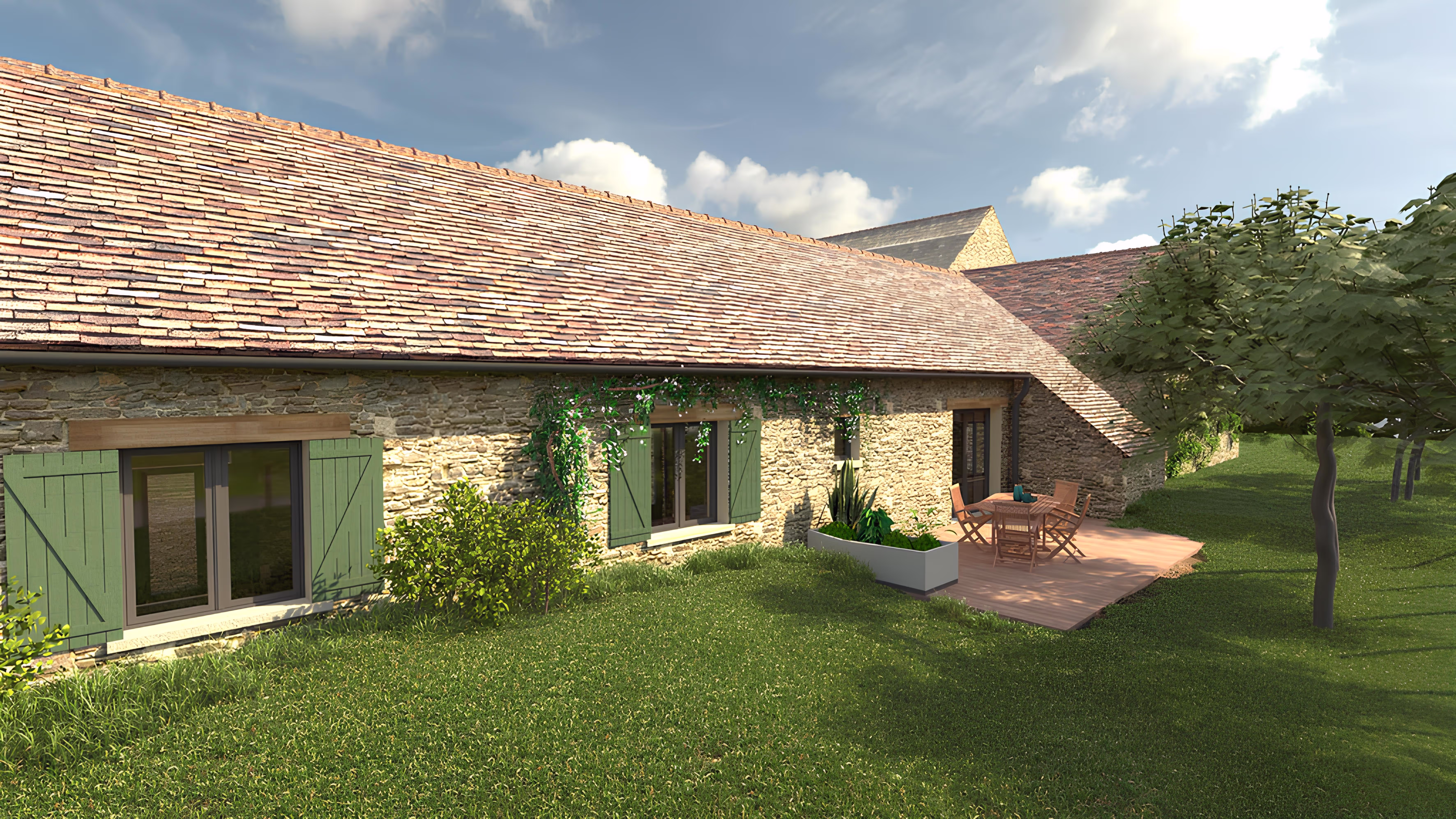 Vue extérieure du gîte avec terrasse boisée et jardin arboré, projet Le Gîte de la Tuilerie par SINA Architecture.